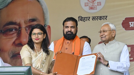 Patna: Bihar Chief Minister Nitish Kumar with Deputy Chief Minister Samrat Choudhary during distribution of appointment letters to newly appointed teachers, in Patna, Sunday, March 9, 2025. (PTI Photo)(PTI03_09_2025_000071A)